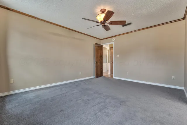 a view of a ceiling fan in a room