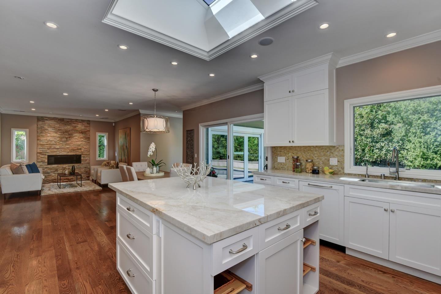 650 Chesley Avenue Mountain View, CA 94040 - Photo 12 of 32 a kitchen with sink stove and cabinets