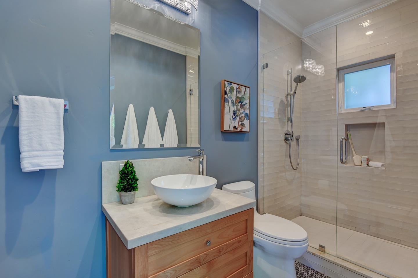 650 Chesley Avenue Mountain View, CA 94040 - Photo 16 of 32 a bathroom with a sink a toilet and shower