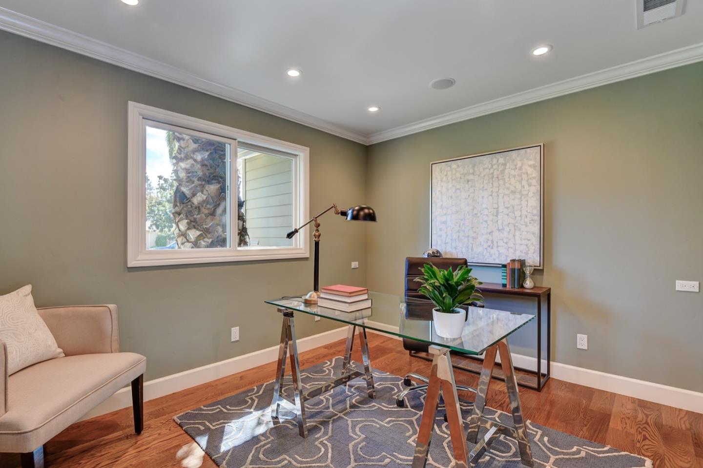 650 Chesley Avenue Mountain View, CA 94040 - Photo 18 of 32 a view of a livingroom with furniture and wooden floor