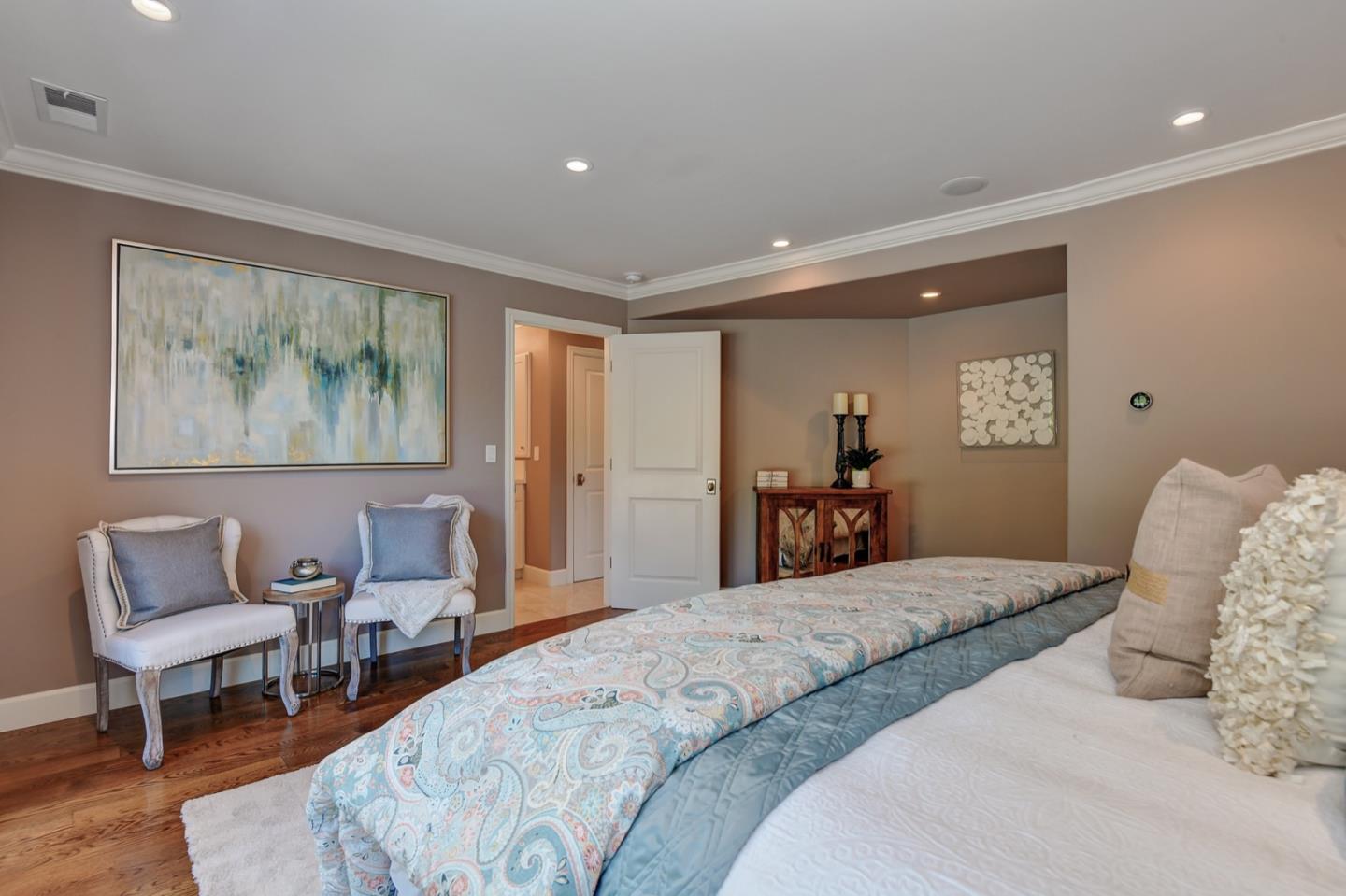 650 Chesley Avenue Mountain View, CA 94040 - Photo 21 of 32 a bedroom with a bed and wooden floor