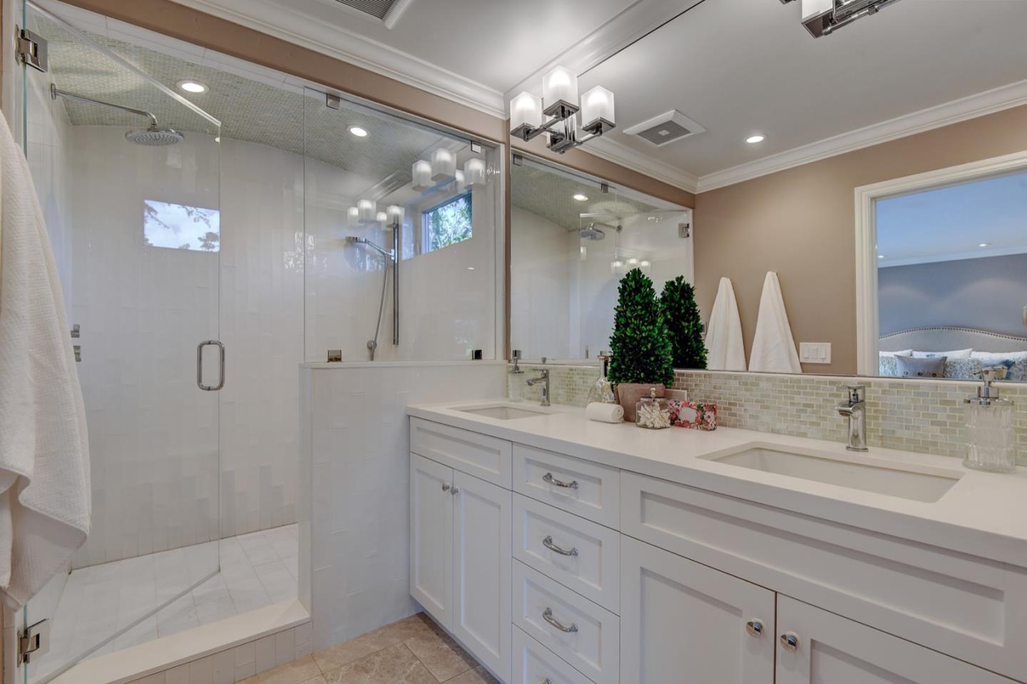 650 Chesley Avenue Mountain View, CA 94040 - Photo 22 of 32 a bathroom with a double vanity sink mirror and shower