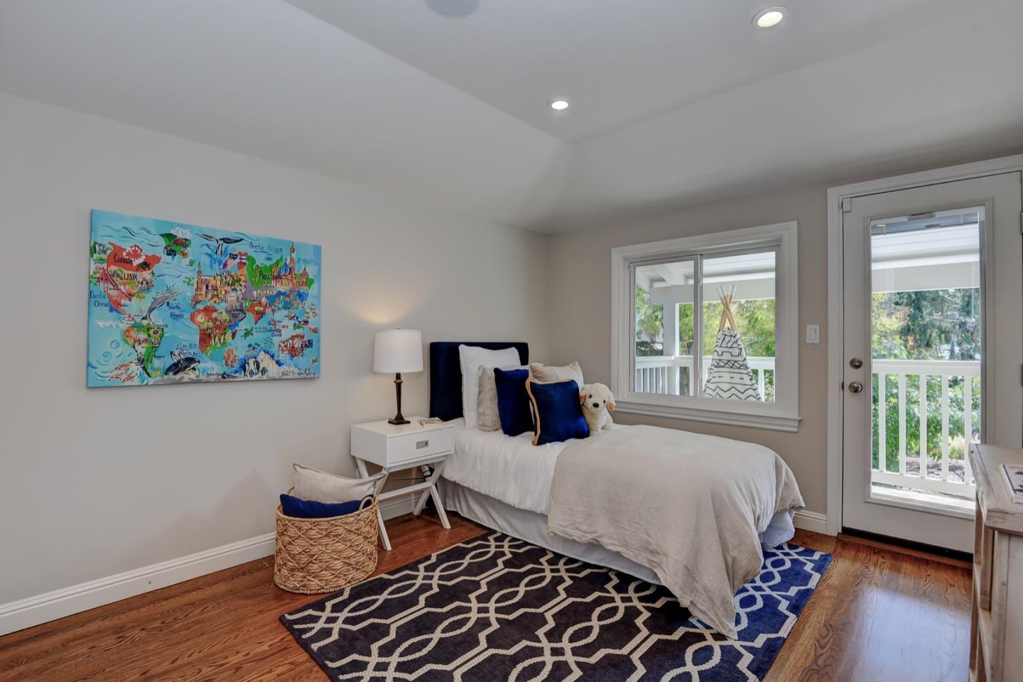 650 Chesley Avenue Mountain View, CA 94040 - Photo 24 of 32 a bedroom with a bed and a painting on the wall