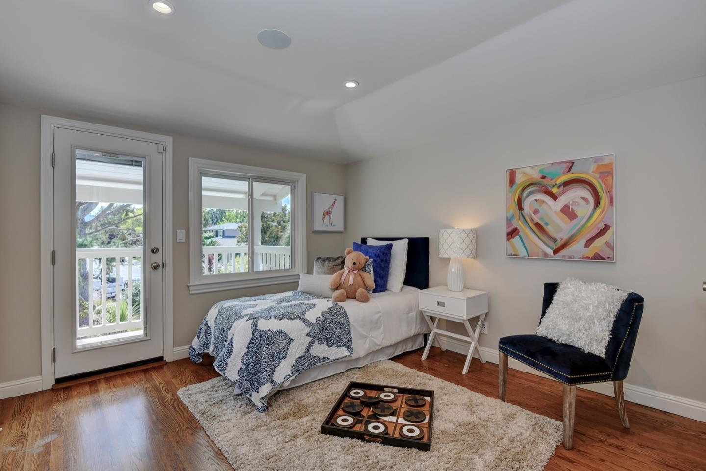650 Chesley Avenue Mountain View, CA 94040 - Photo 25 of 32 a bedroom with furniture and a wooden floor