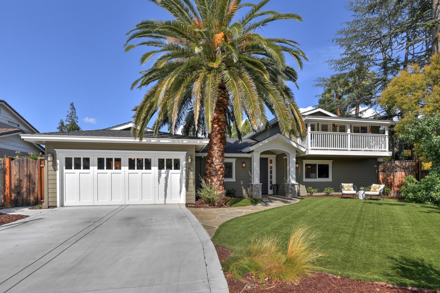 650 Chesley Avenue Mountain View, CA 94040 - Photo 4 of 32 a front view of a house with a garden and yard