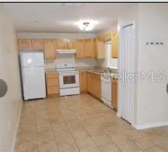 a view of a kitchen with a sink