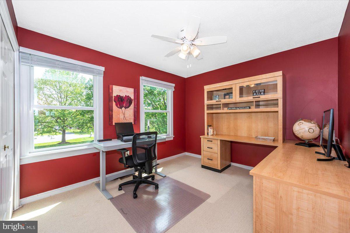 8412 Dasher Court Gaithersburg, MD 20882 - Photo 35 of 83 a work room with furniture and wooden floor
