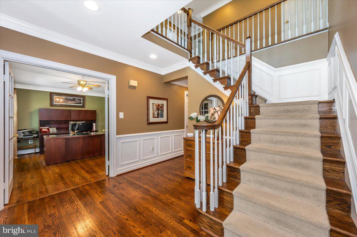 8412 Dasher Court Gaithersburg, MD 20882 - Photo 4 of 83 a view of entryway and hall with wooden floor