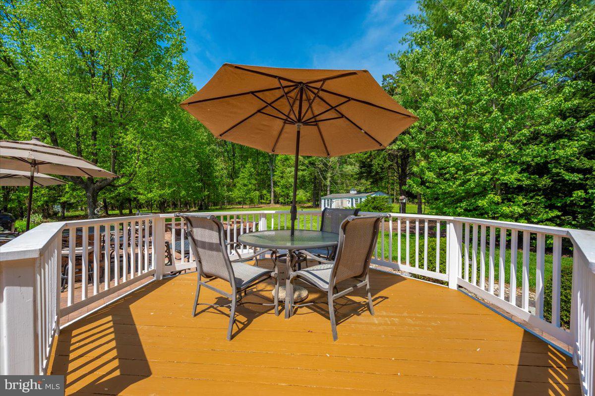 8412 Dasher Court Gaithersburg, MD 20882 - Photo 53 of 83 a view of a chair and table on the roof deck