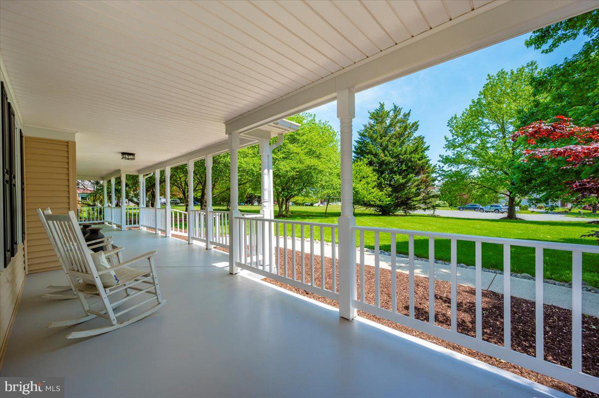 8412 Dasher Court Gaithersburg, MD 20882 - Photo 82 of 83 a view of an chairs and tables in the patio