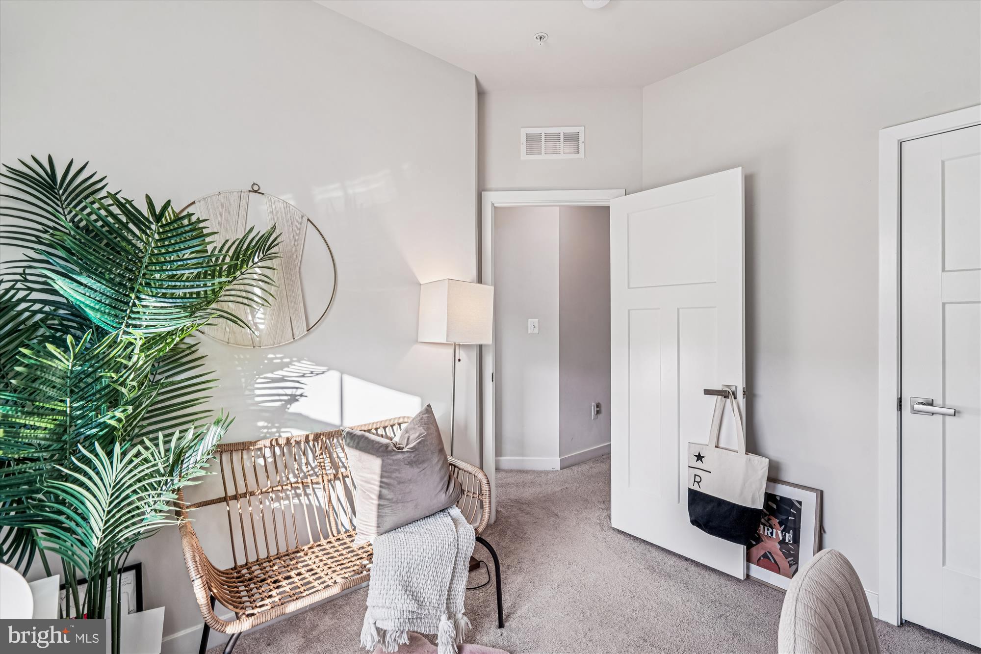 136 Brown Branch Road Laurel, MD 20708 - Photo 21 of 44 a living room with furniture and a potted plant