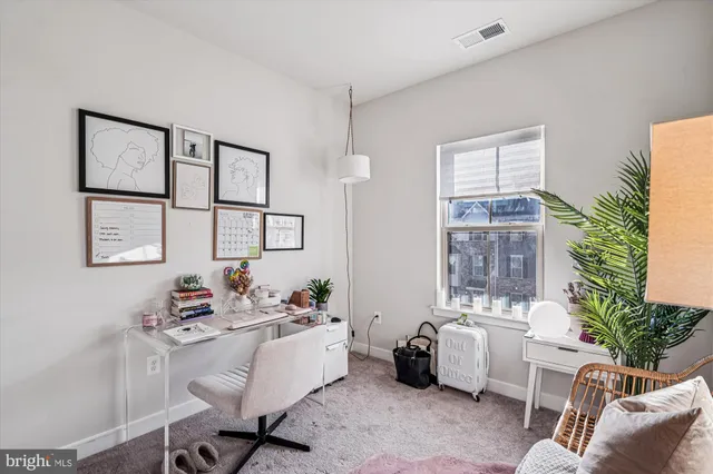 a room with furniture and window