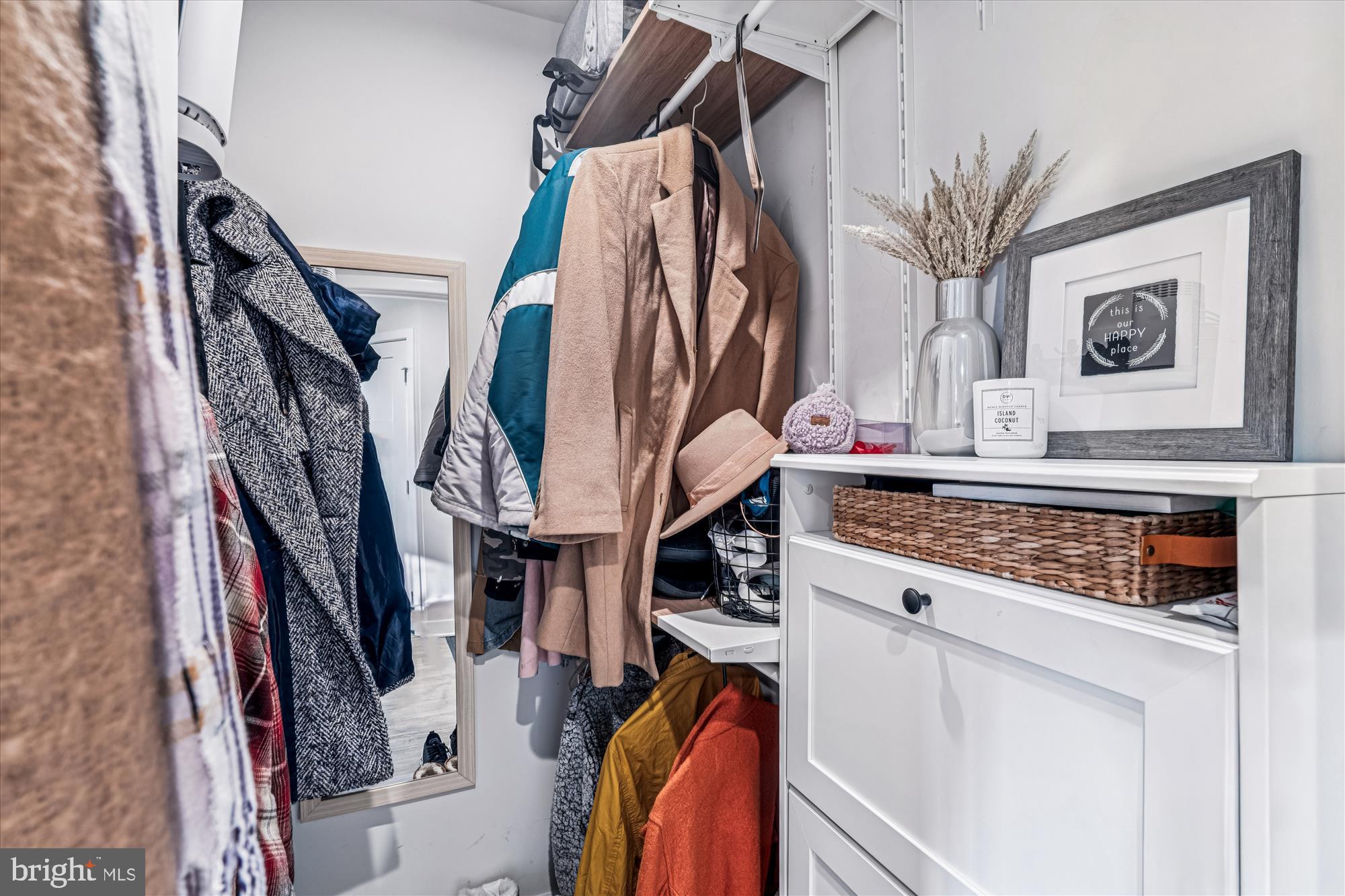 136 Brown Branch Road Laurel, MD 20708 - Photo 24 of 44 a view of walk in closet with clothes and shoes