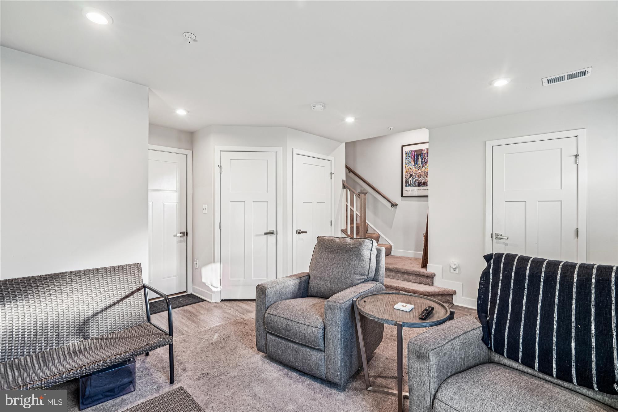 136 Brown Branch Road Laurel, MD 20708 - Photo 25 of 44 a living room with furniture and a ceiling fan