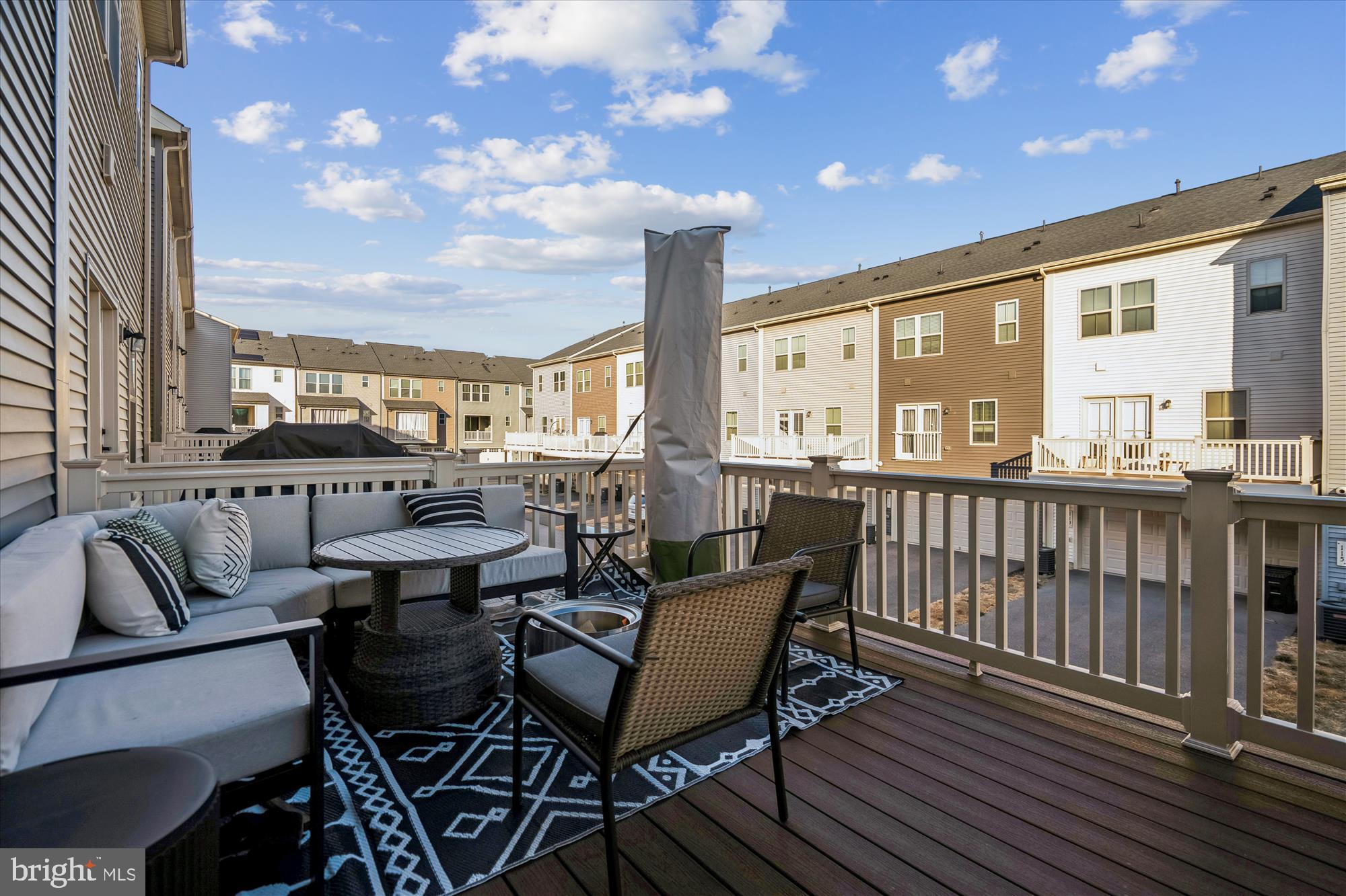 136 Brown Branch Road Laurel, MD 20708 - Photo 32 of 44 a view of a balcony with furniture and a table