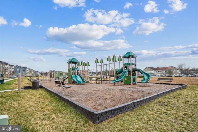a view of a swimming pool with a lounge chairs