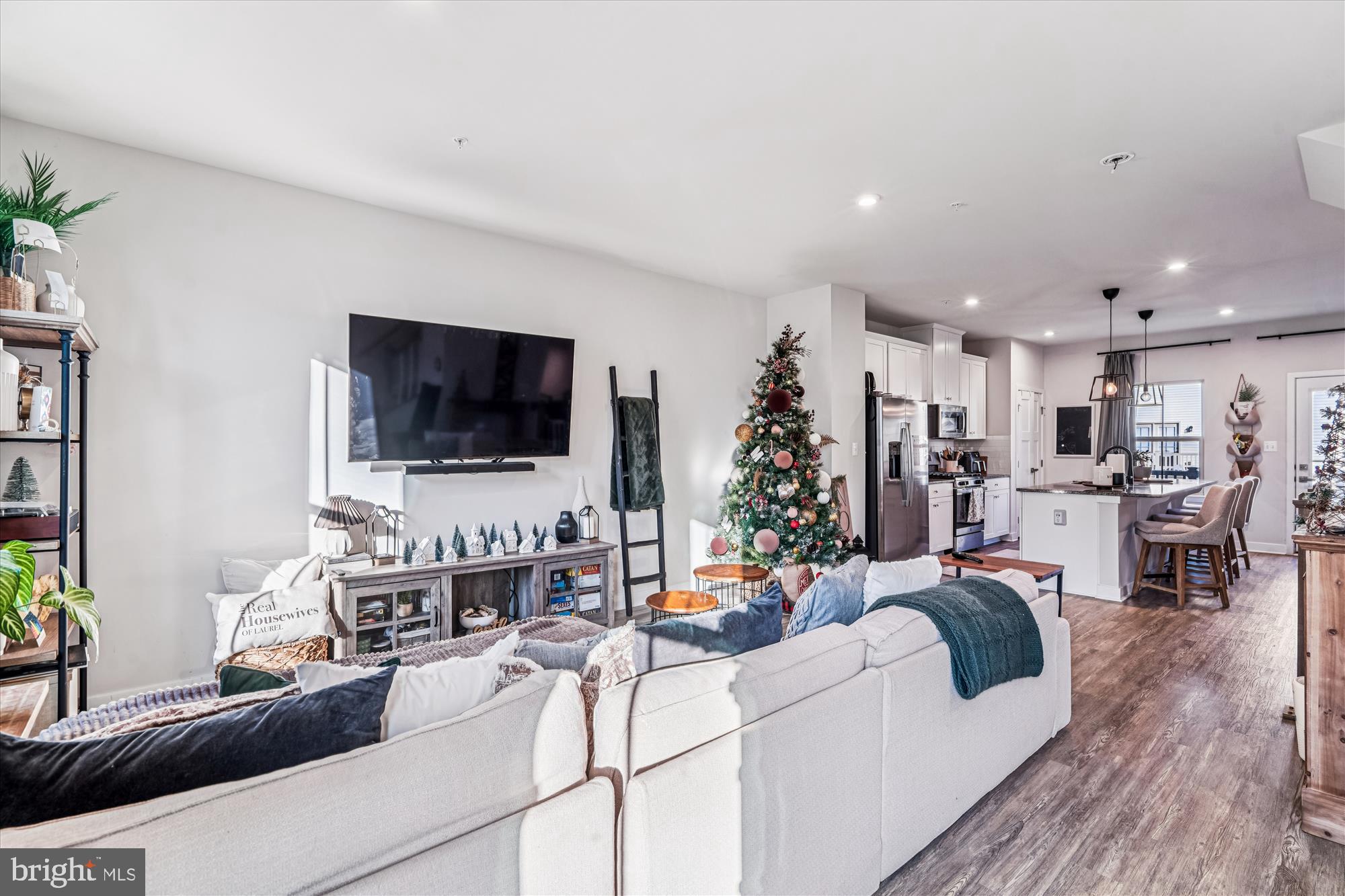 136 Brown Branch Road Laurel, MD 20708 - Photo 4 of 44 a living room with furniture and a flat screen tv
