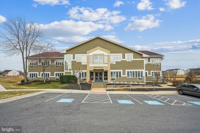 a front view of a building with street view