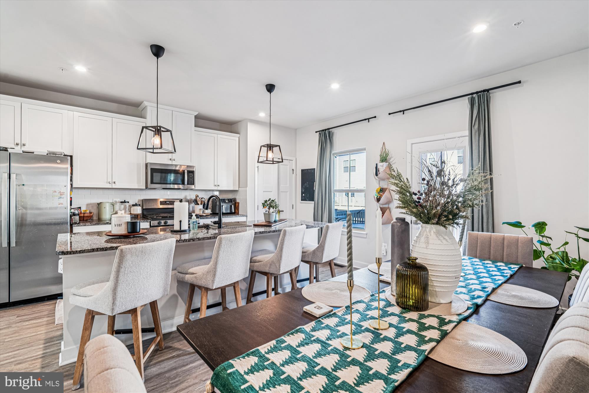 136 Brown Branch Road Laurel, MD 20708 - Photo 7 of 44 a living room with furniture kitchen view and a chandelier