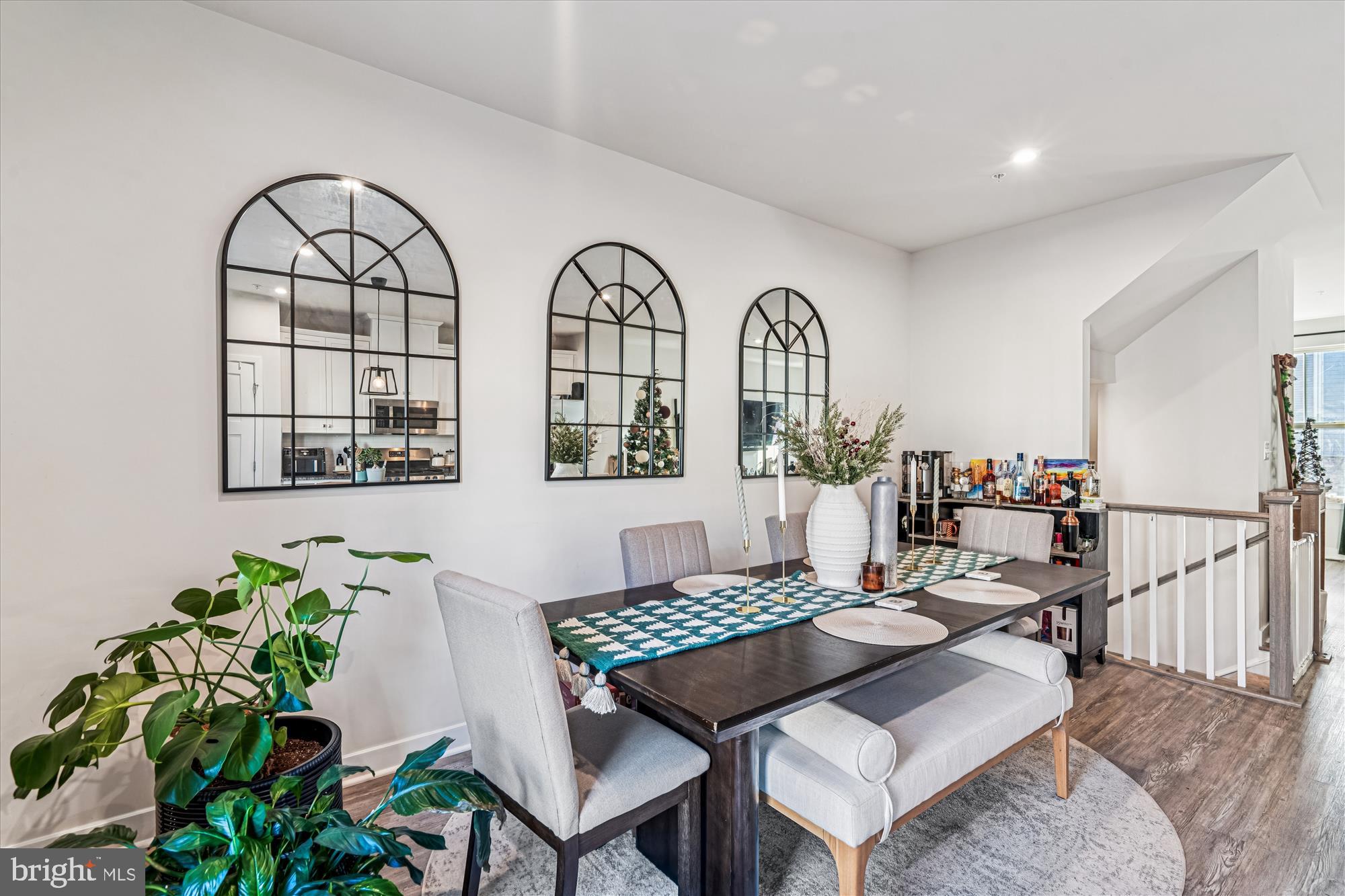 136 Brown Branch Road Laurel, MD 20708 - Photo 10 of 44 a living room with couches a table and a potted plant