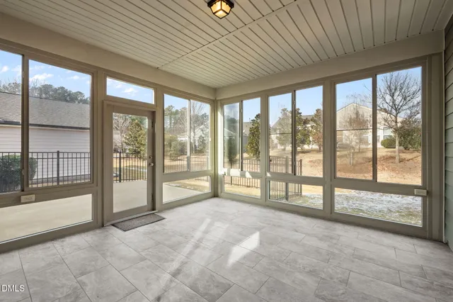 a view of kitchen with kitchen island stainless steel appliances refrigerator stove and oven