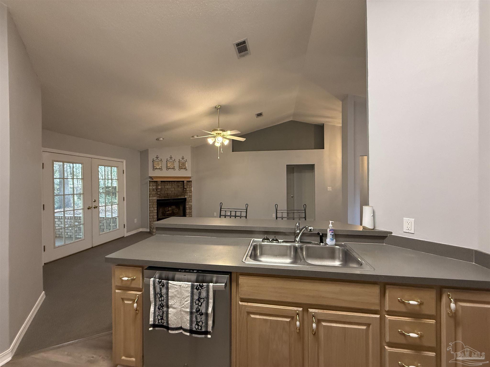 5700 Charmonte Way Milton, FL 32583 - Photo 12 of 29 a bathroom with a sink and a mirror