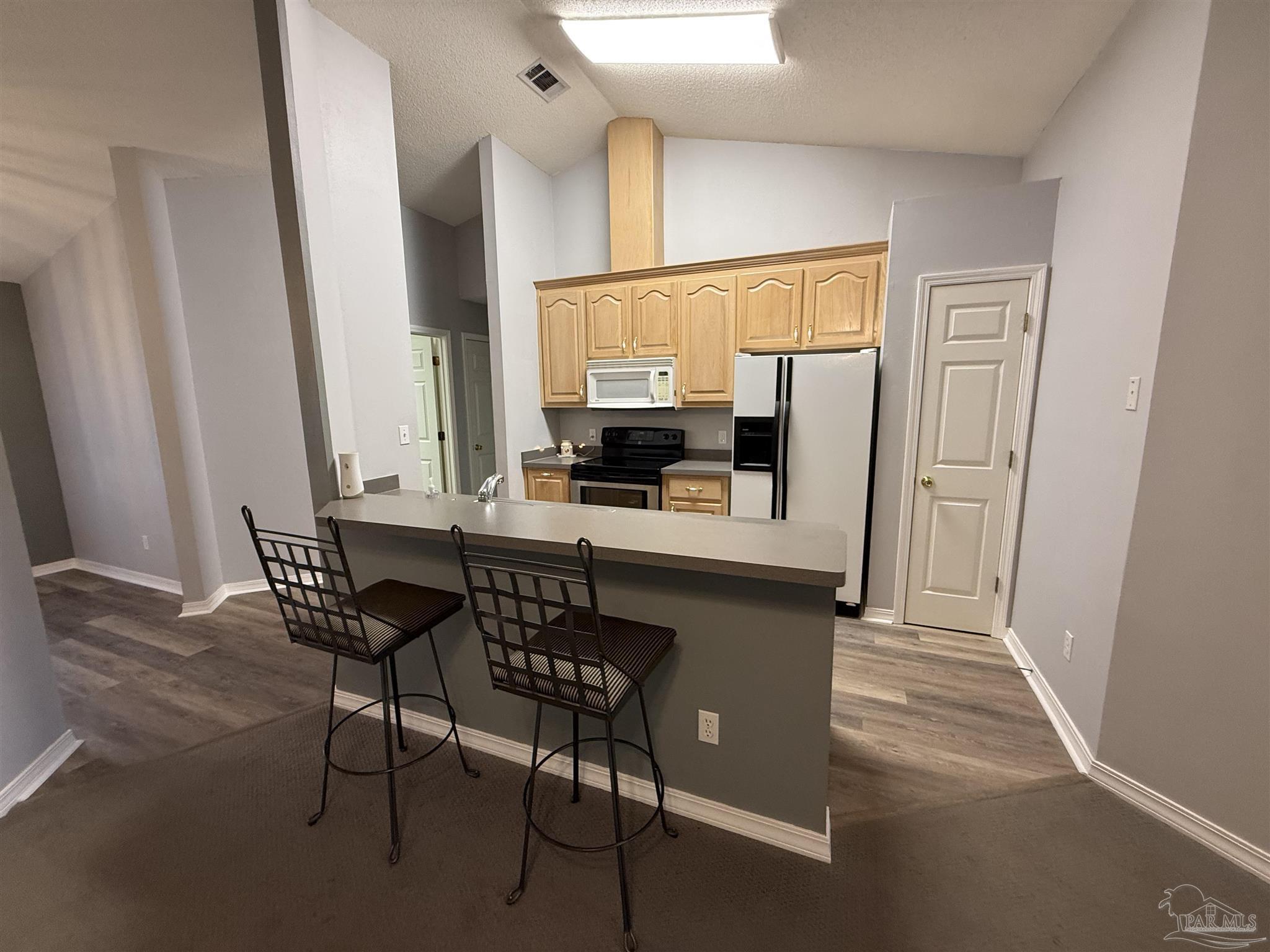 5700 Charmonte Way Milton, FL 32583 - Photo 14 of 29 a dining room with furniture and window