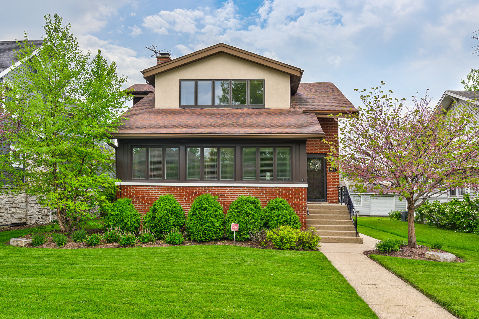 620 South Prospect Avenue Park Ridge, IL 60068 - Photo 1 of 39 a front view of a house with a yard