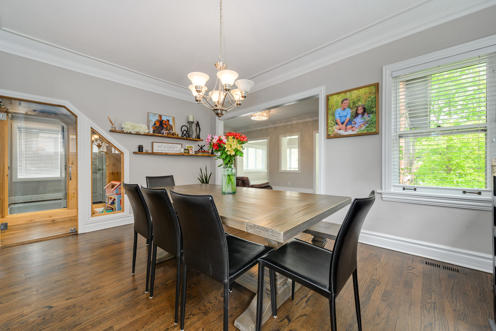 620 South Prospect Avenue Park Ridge, IL 60068 - Photo 11 of 39 a view of a dining room with furniture a chandelier and wooden floor