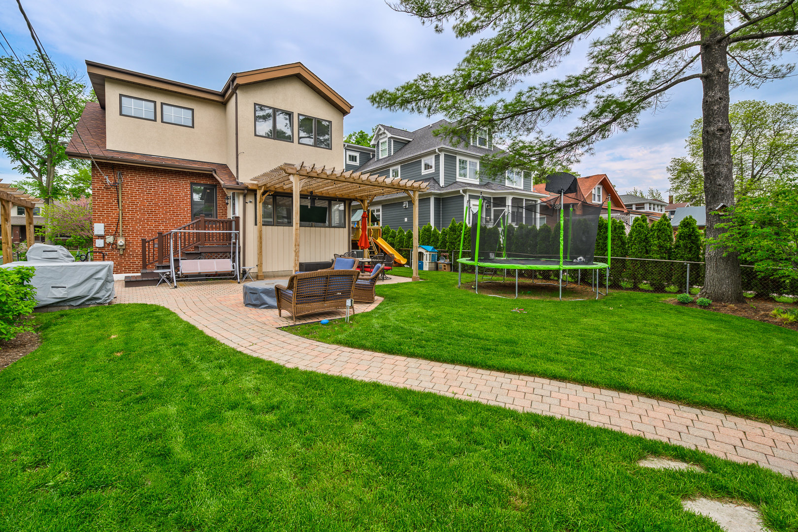 620 South Prospect Avenue Park Ridge, IL 60068 - Photo 35 of 39 a view of a house with a big yard and large trees