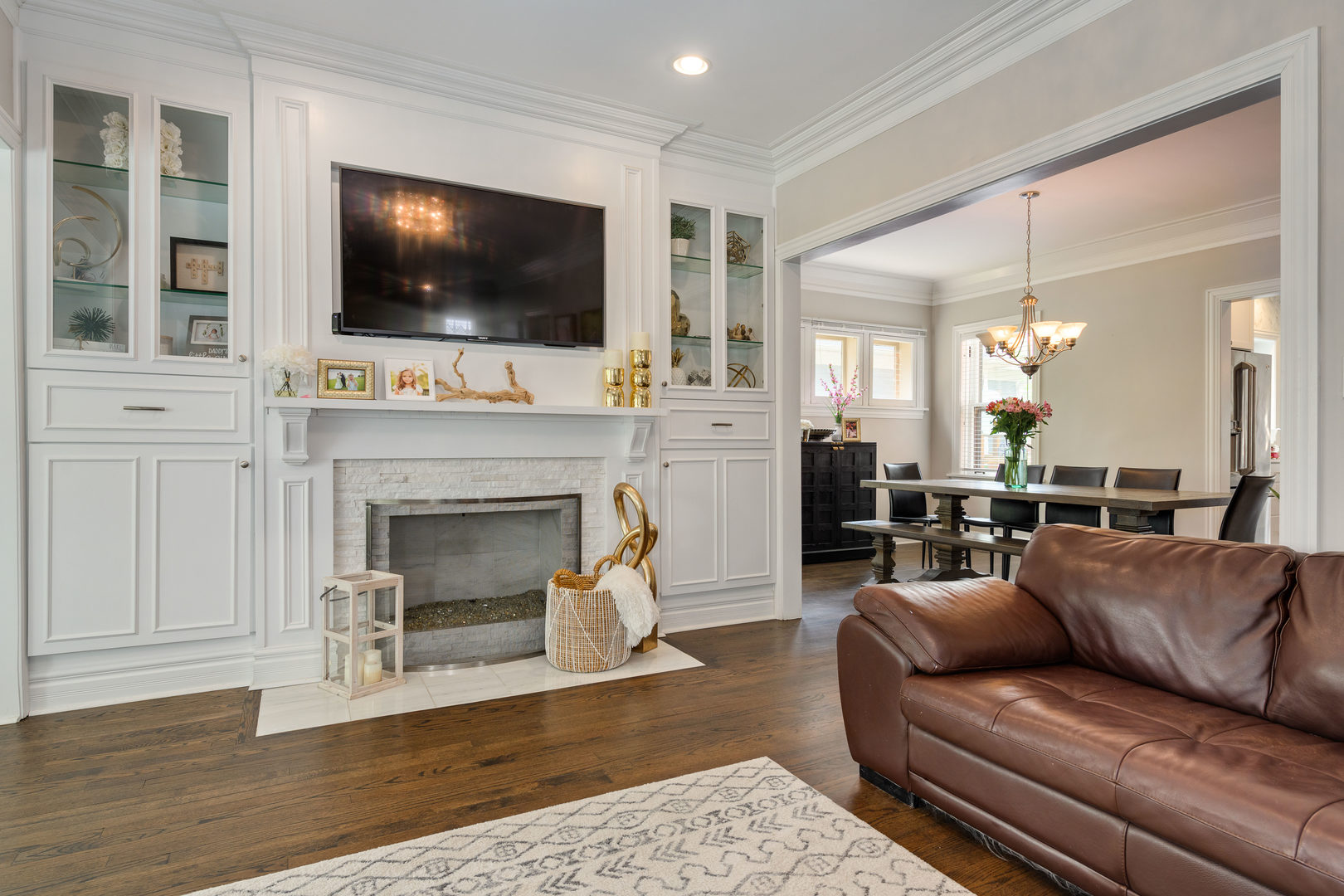 620 South Prospect Avenue Park Ridge, IL 60068 - Photo 5 of 39 a living room with fireplace furniture and a flat screen tv