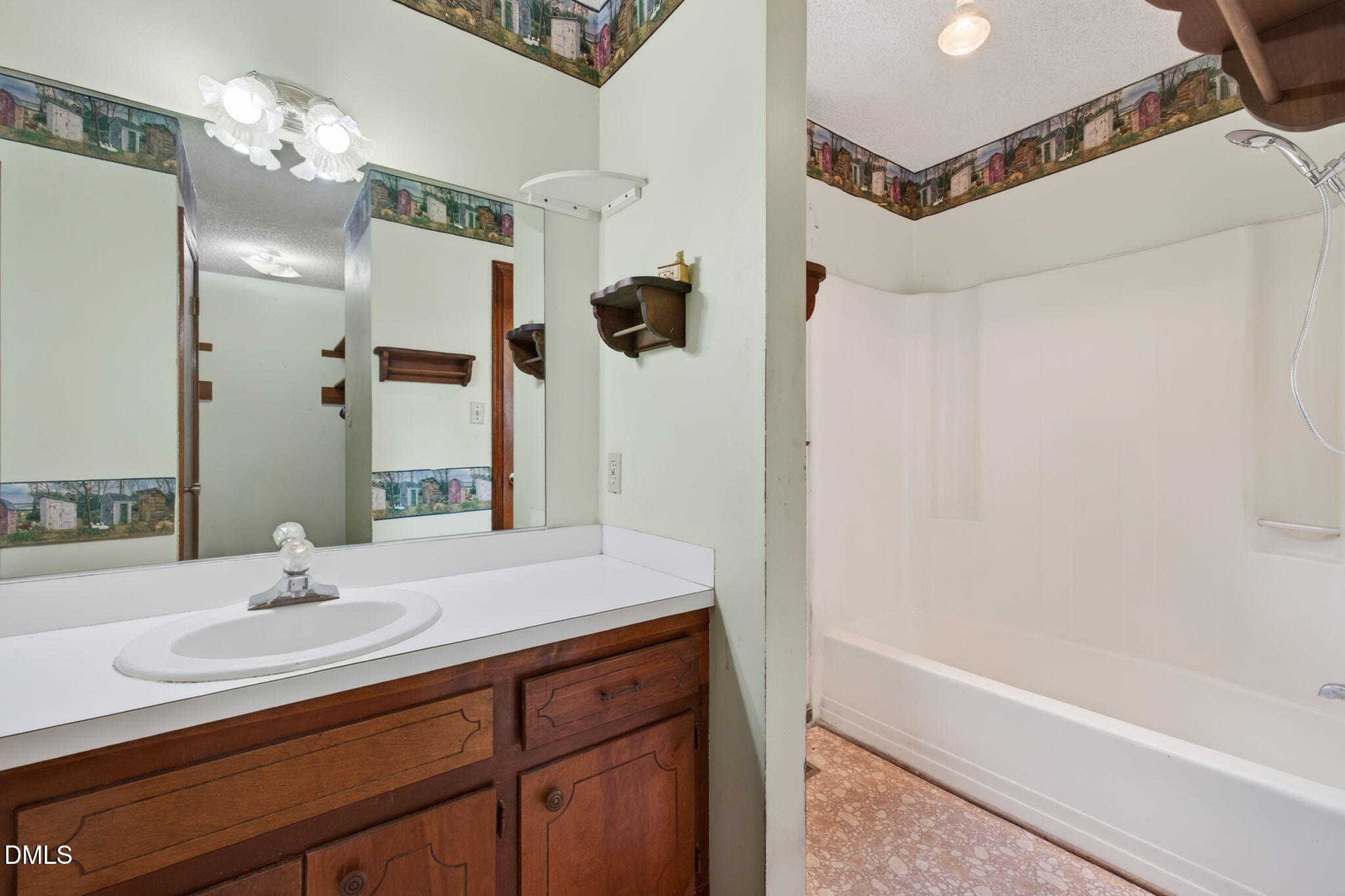350 Grantham School Road Goldsboro, NC 27530 - Photo 17 of 49 a bathroom with a sink vanity granite tub shower and a mirror
