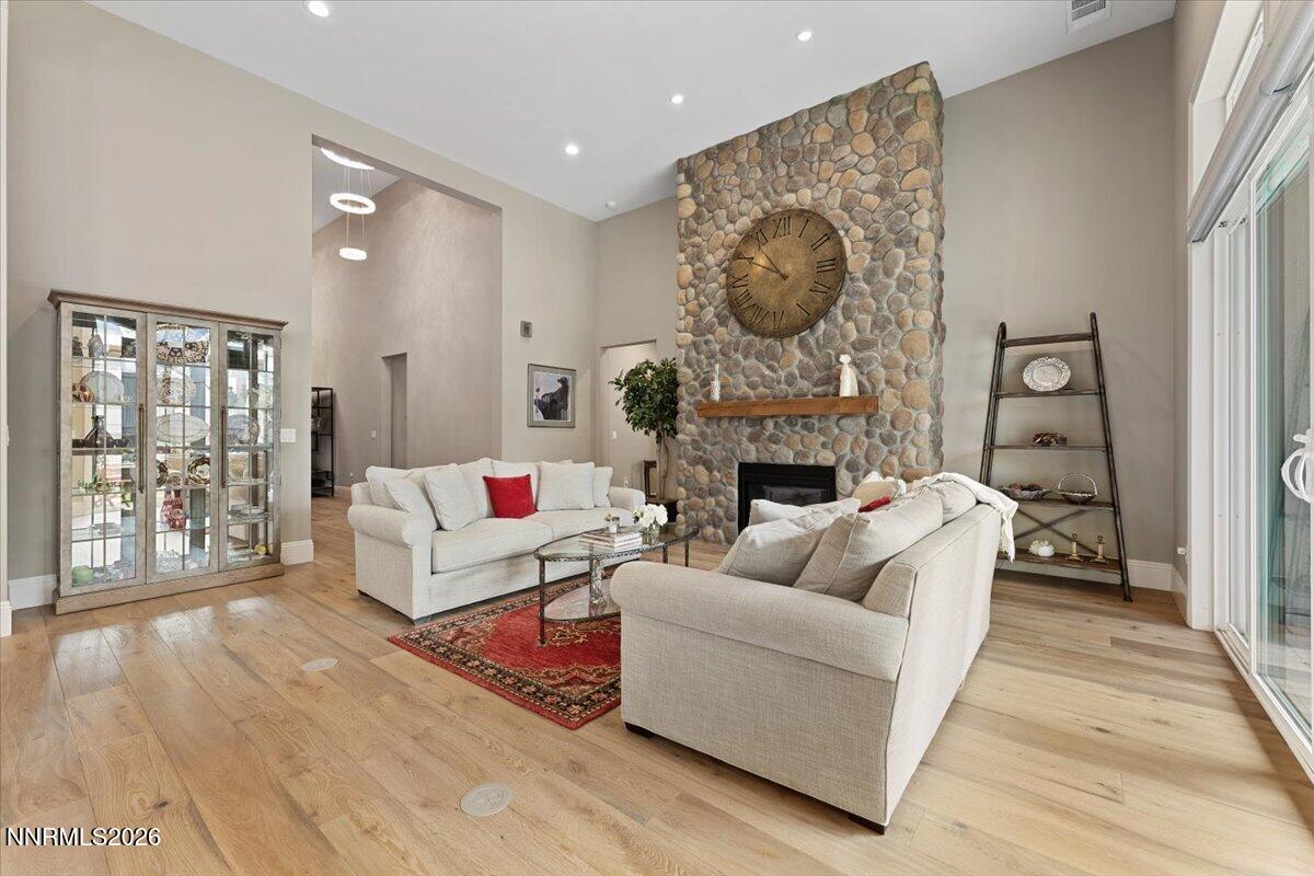 722 West Pleasant Oak Trail Reno, NV 89511 - Photo 11 of 98 a living room with furniture and a fireplace