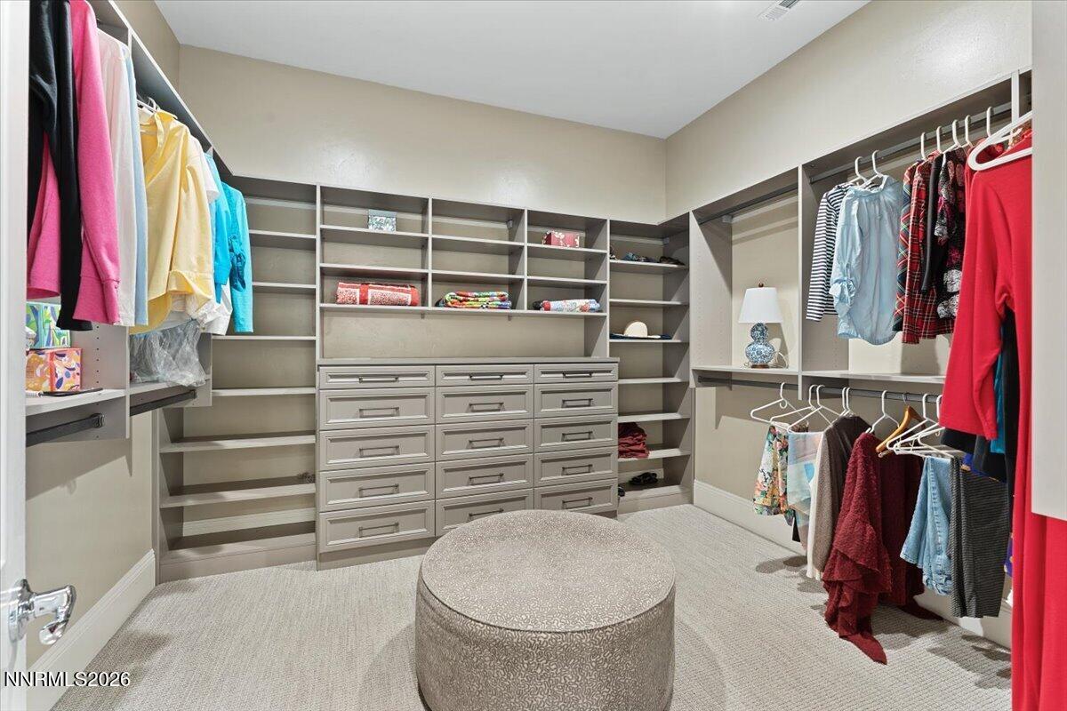 722 West Pleasant Oak Trail Reno, NV 89511 - Photo 26 of 98 a view of walk in closet with clothes and shoes