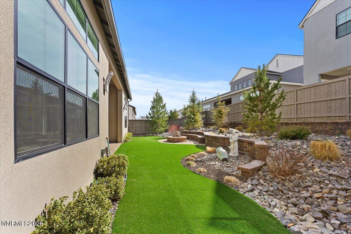 722 West Pleasant Oak Trail Reno, NV 89511 - Photo 42 of 98 a view of a backyard with plants and a garden
