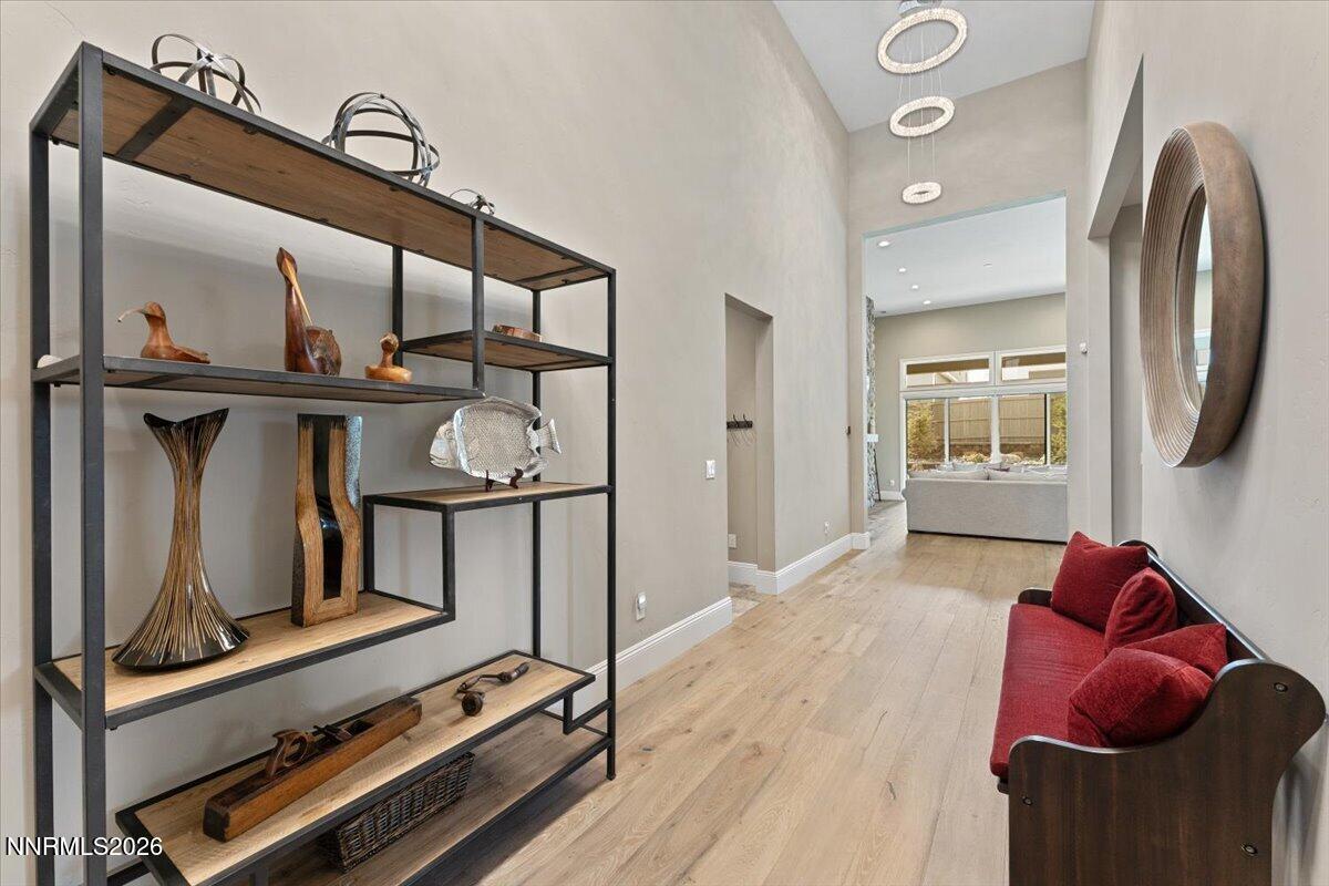 722 West Pleasant Oak Trail Reno, NV 89511 - Photo 5 of 98 a view of a room with wooden floor and mirror