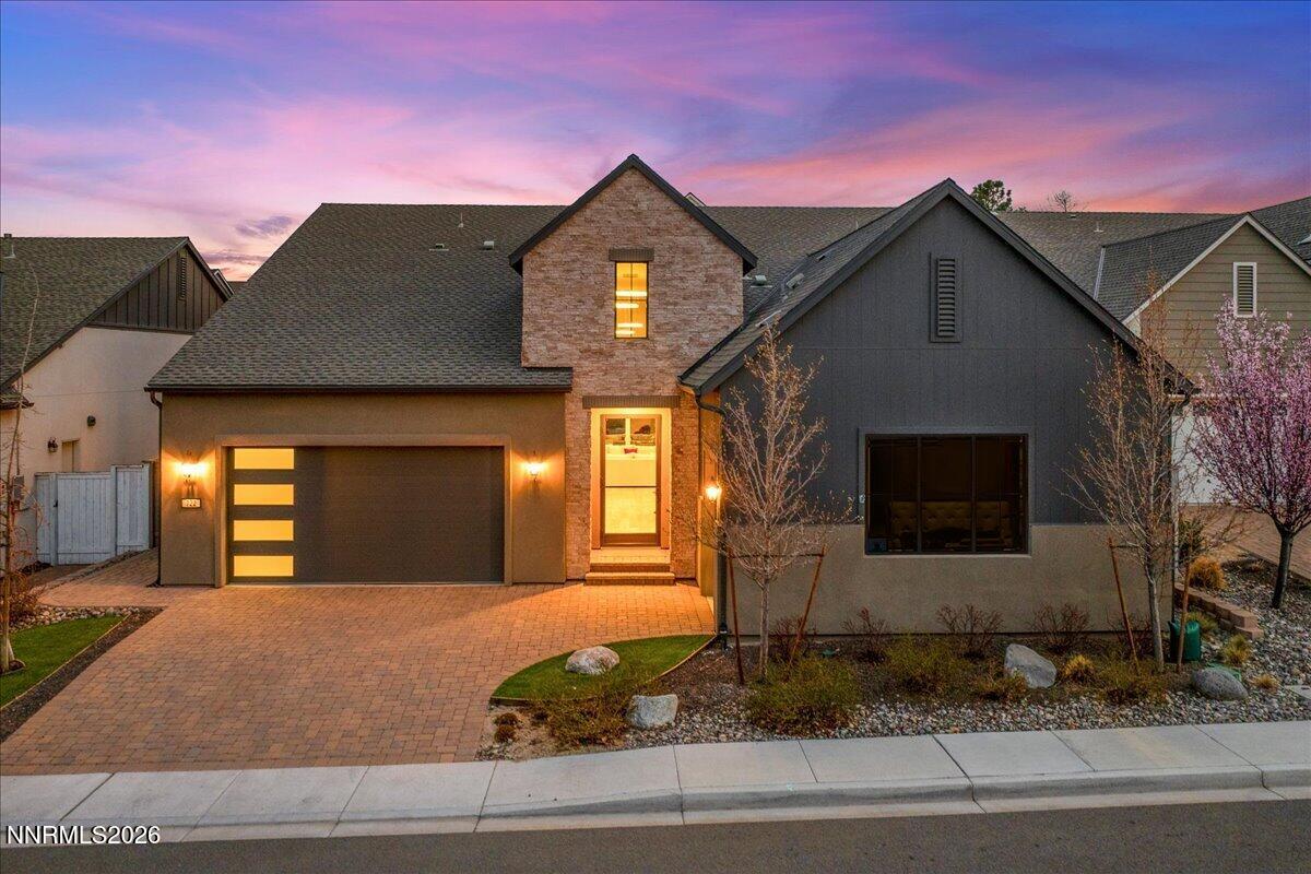 722 West Pleasant Oak Trail Reno, NV 89511 - Photo 55 of 98 a front view of a house with a yard and garage