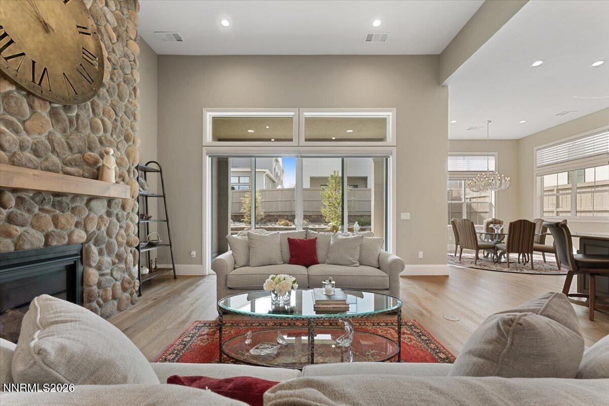 722 West Pleasant Oak Trail Reno, NV 89511 - Photo 8 of 98 a living room with furniture and a fireplace