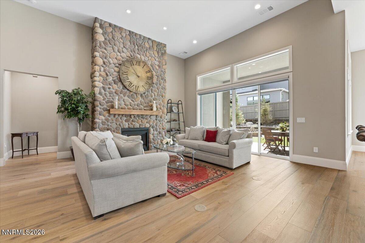 722 West Pleasant Oak Trail Reno, NV 89511 - Photo 9 of 98 a living room with furniture and a fireplace