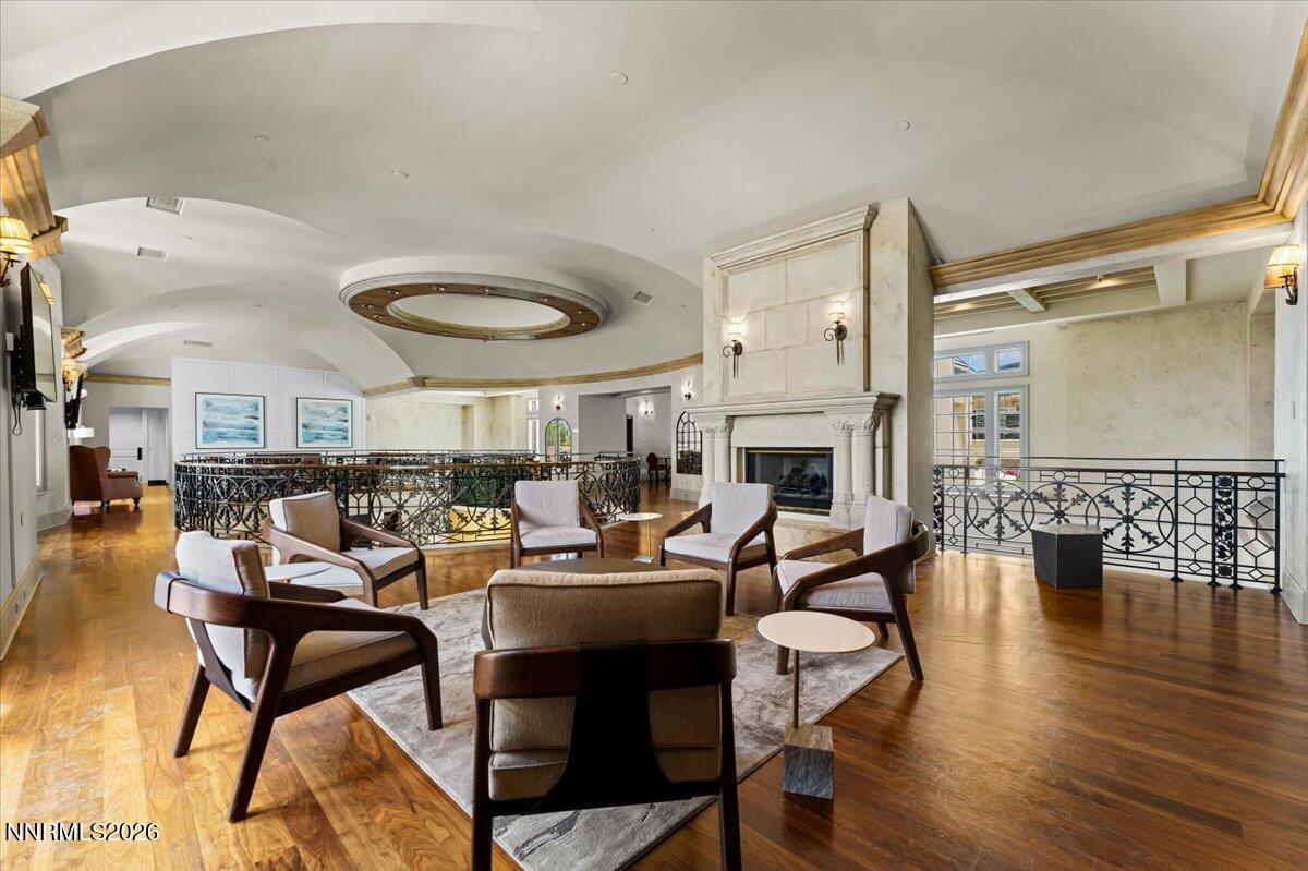 722 West Pleasant Oak Trail Reno, NV 89511 - Photo 92 of 98 a living room with fireplace furniture and a large window