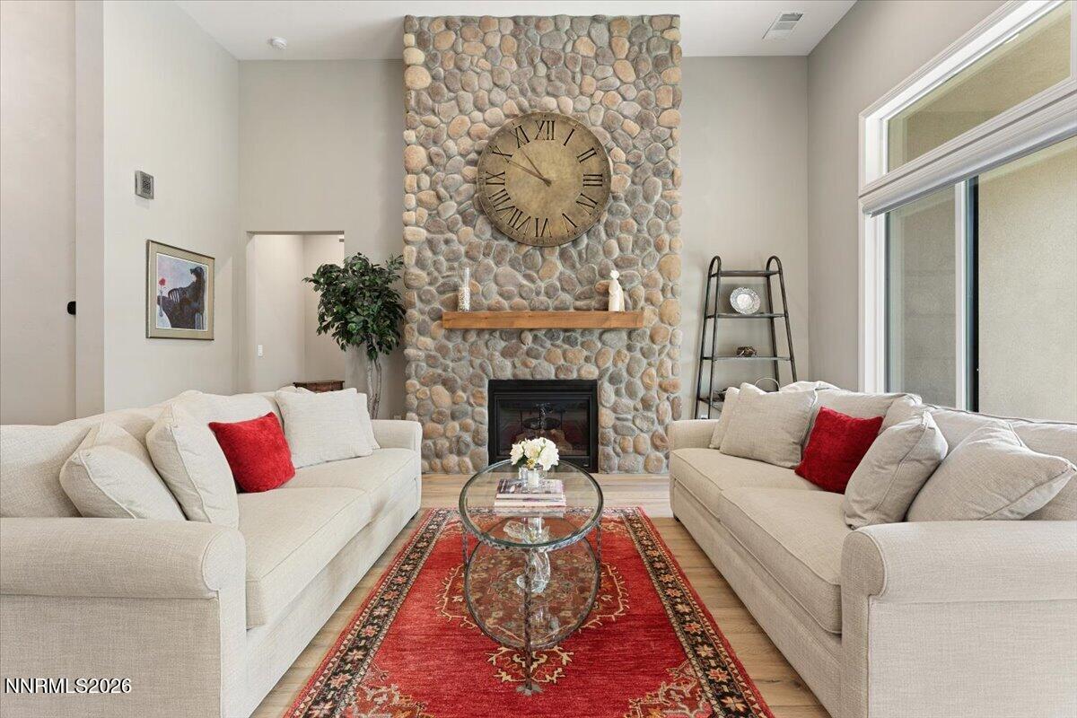 722 West Pleasant Oak Trail Reno, NV 89511 - Photo 10 of 98 a living room with furniture and a fireplace