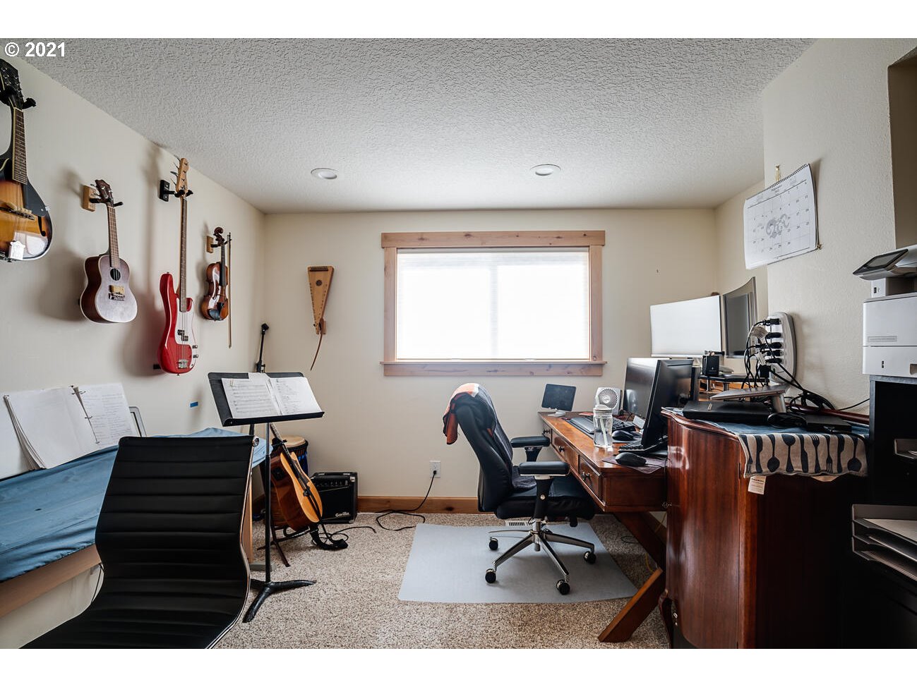 22255 Southeast Ridgeview Drive Damascus, OR 97089 - Photo 22 of 32 a view of a workspace with furniture and a window