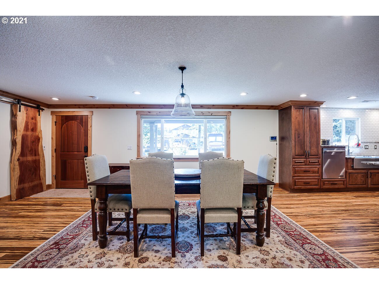 22255 Southeast Ridgeview Drive Damascus, OR 97089 - Photo 4 of 32 a view of a dining room with furniture