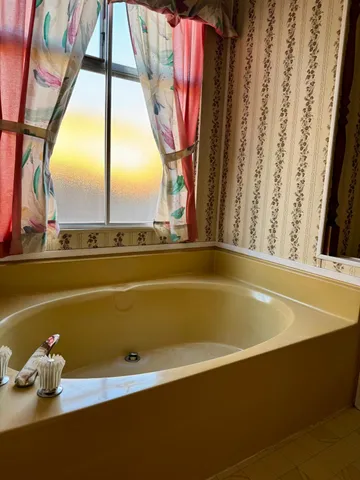 a view of swimming pool with couch