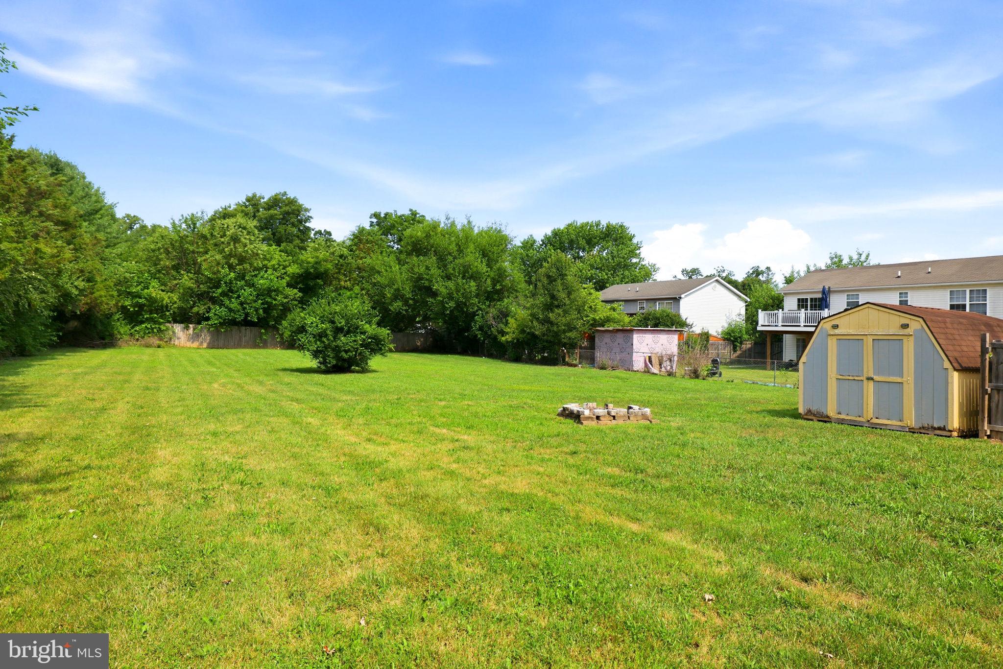 306 Fegan Road Bunker Hill, WV 25413 - Photo 12 of 54 Spacious green oasis awaits your vision.