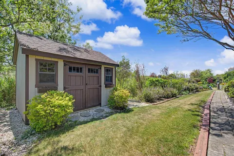a view of a house with garden