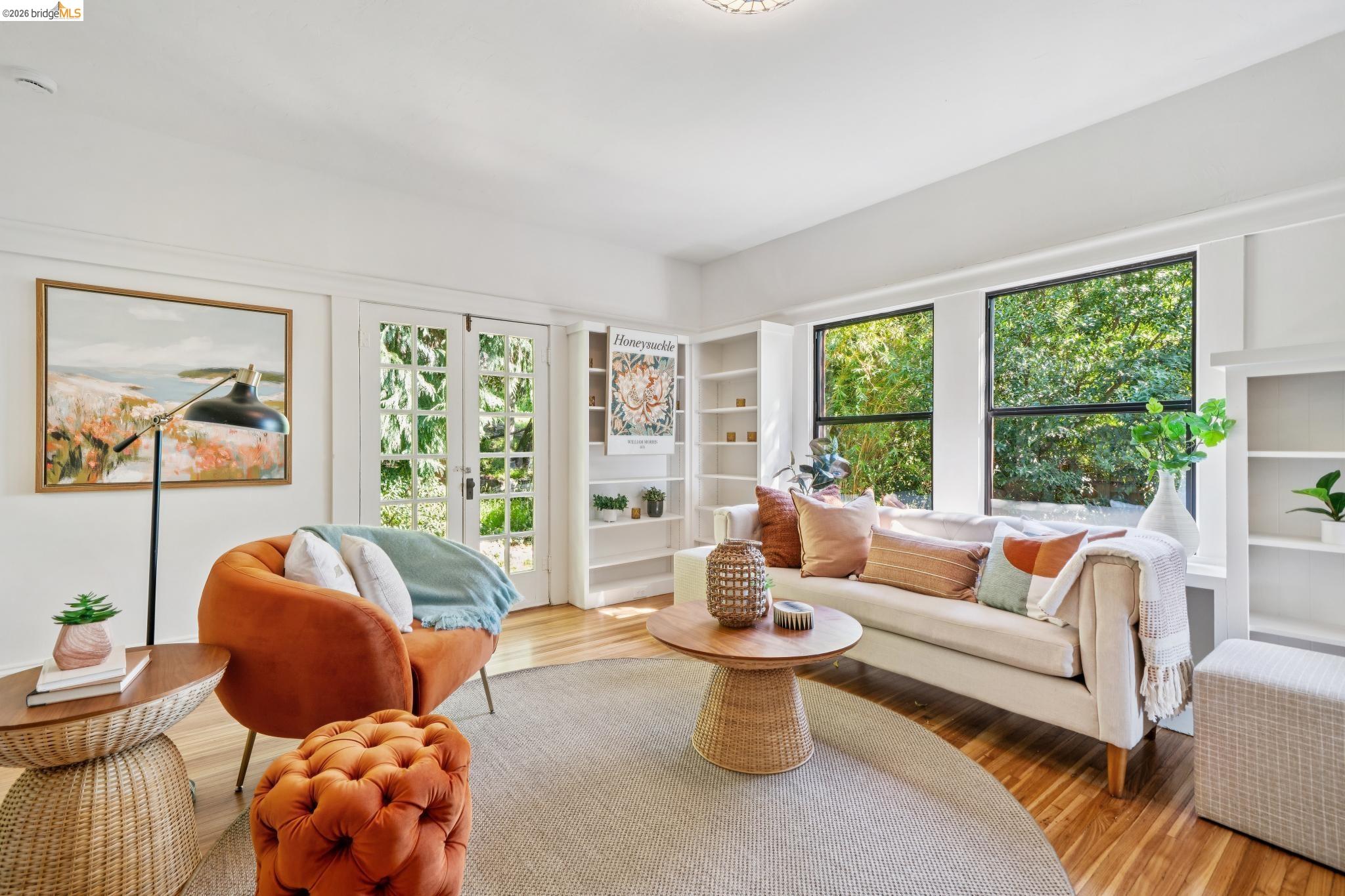 813 San Diego Road Berkeley, CA 94707 - Photo 30 of 60 a living room with furniture and a large window