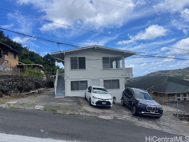 a car parked in front of a house