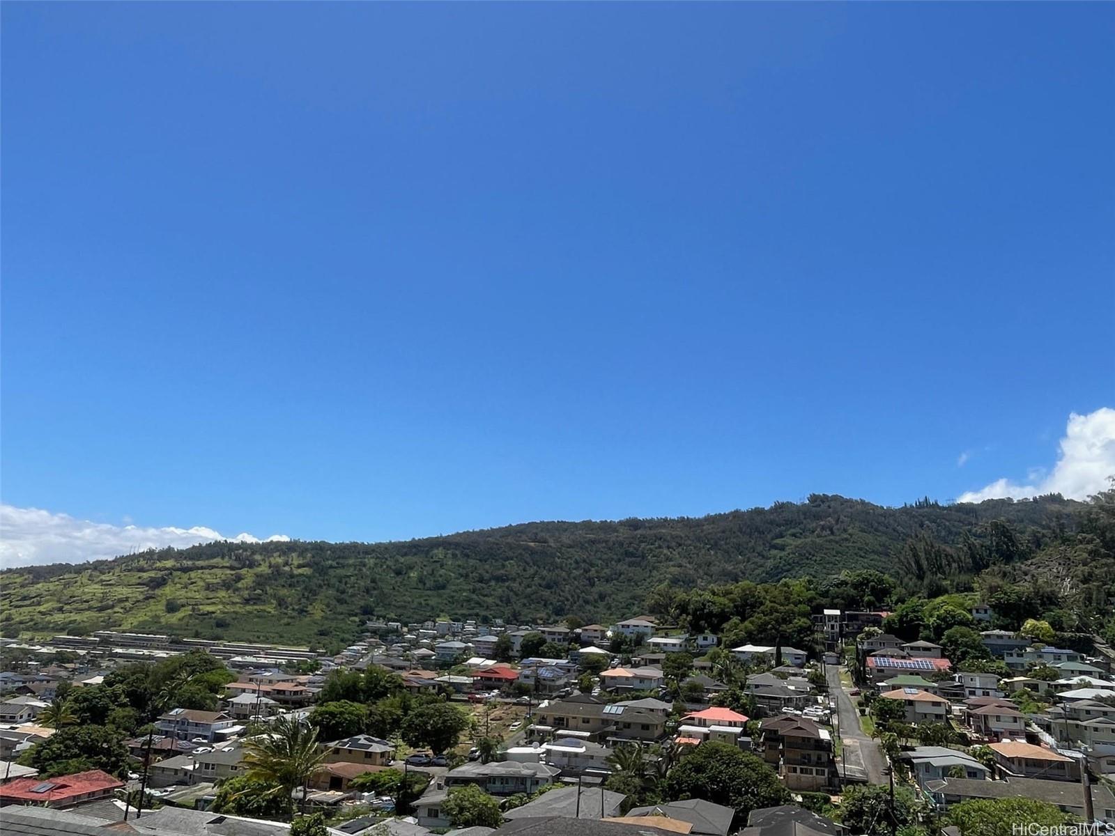 1565 Moani Street Honolulu, HI 96819 - Photo 14 of 22 a view of a city with mountains in the background