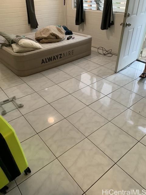 1565 Moani Street Honolulu, HI 96819 - Photo 16 of 22 a living room with a couch